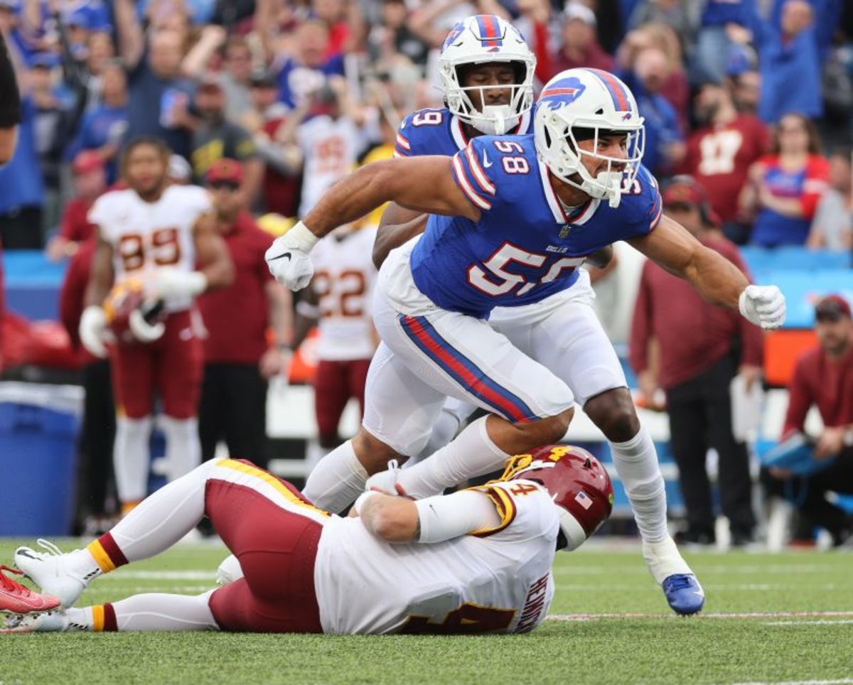 Buffalo Bills linebacker Matt Milano tackles Washington quarterback Taylor Heinicke.